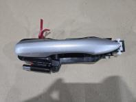 Ручка двери задняя левая Toyota Corolla E210 (MZEH12) OEM 69210-02B70-C4 общий вид б/у запчасти