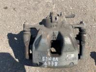 Суппорт тормозной передний левый Toyota Corolla E210 OEM 47750-02190 общий вид с фланцем крепления