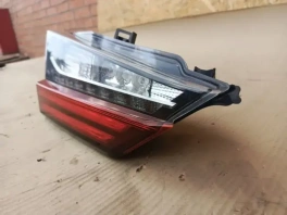 Левый фонарь в крышку багажника Lexus RX 4 OEM 81591-48200 вид спереди