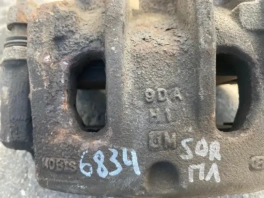 Суппорт тормозной Kia Sorento Prime б/у OEM 582403M000 левый перед вид спереди