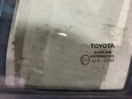 Форточка передней левой двери Toyota Corolla E210 OEM 68141-02120 общий вид