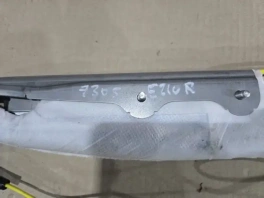 Подушка безопасности в сиденье Toyota Corolla E210 Передняя Правая (73910-0D030-A0) на фоне стеллажа