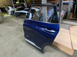 Задняя левая дверь Hyundai Santa Fe 4 TM OEM 77003-S1000. Фото панорамы детали после дефектовки на складе в Санкт-Петербурге.