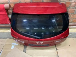 Оригинальная крышка багажника Mazda CX-5 KE 2015 с артикулом KDZ1-62-02XD на стеллаже склада