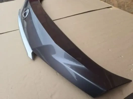 Накладка двери багажника Lexus RX 4 2015-2022 OEM 76801-48440 в хорошем состоянии без коррозии вид спереди